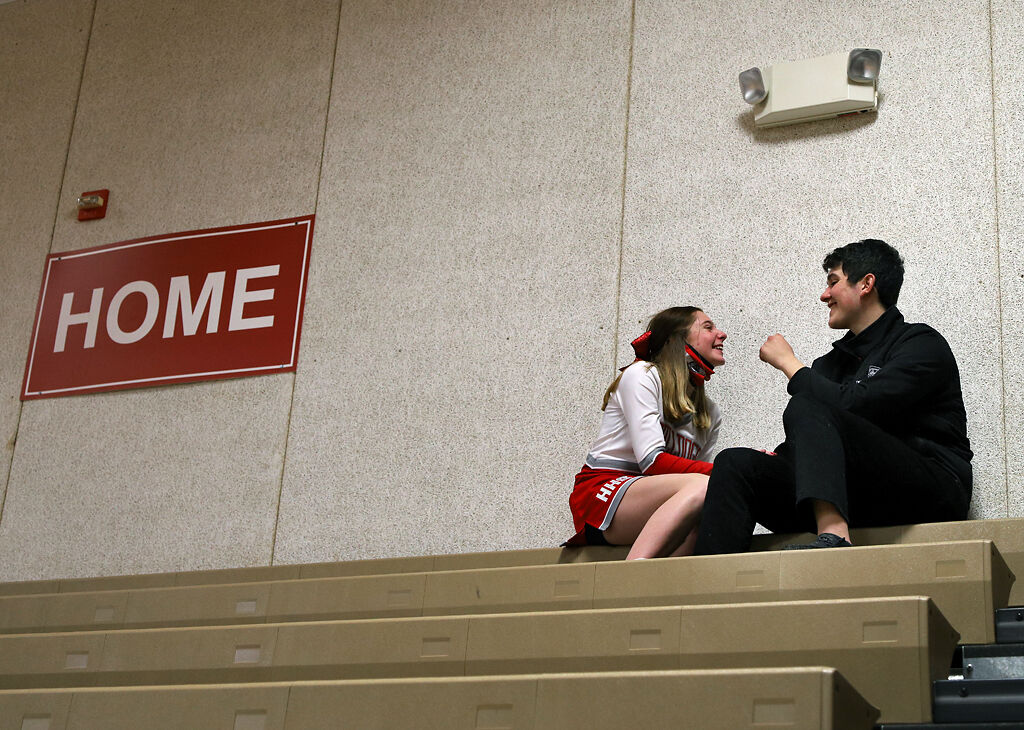 Sadie Brister and David Pavao chat during halftime